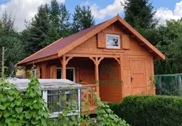 Drewniany domek Wiktor IV z tarasem, Drewnolandia, idealny na lato