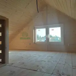 Wnętrze domku CRA4 – przytulna przestrzeń do całorocznego relaksu