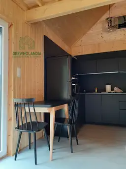 Wnętrze drewnianego domku Wiktor VI – przestronne i komfortowe rozwiązanie