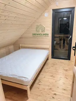 Drewniany domek CRP6 z poddaszem i przestronnym wnętrzem