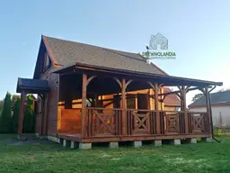 Drewniane domy producent montaz cena