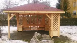 pergola z dwiema ścianami zabudowanymi