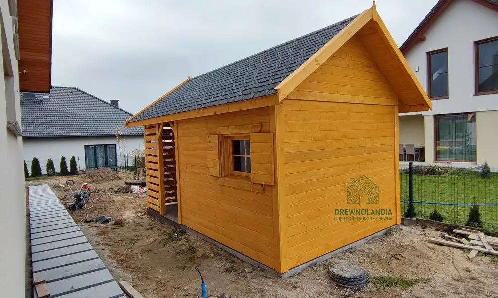 Drewniany domek na narzędzia z drewutnią Kuba 7x2m 