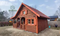 Drewnolandia domek drewniany letniskowy z tarasem Mieszko II - nowoczesny domek całoroczny