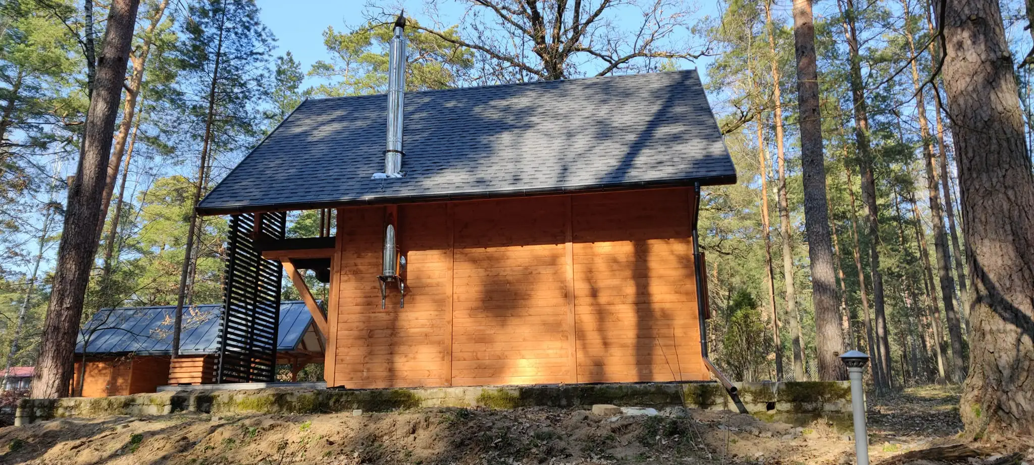 CRA13 - Drewniany domek całoroczny, widok na przestrzeń ogrodową