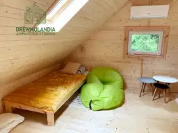 Domek caloroczny wnetrze sypialnia