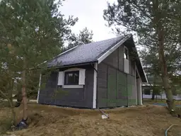 Drewniany domek CRP9 PLUS – wnętrze z widokiem na salon